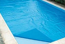 bache piscine bulle sens